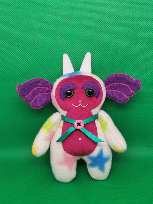 Handmade pocket Goblin plushie in white star print