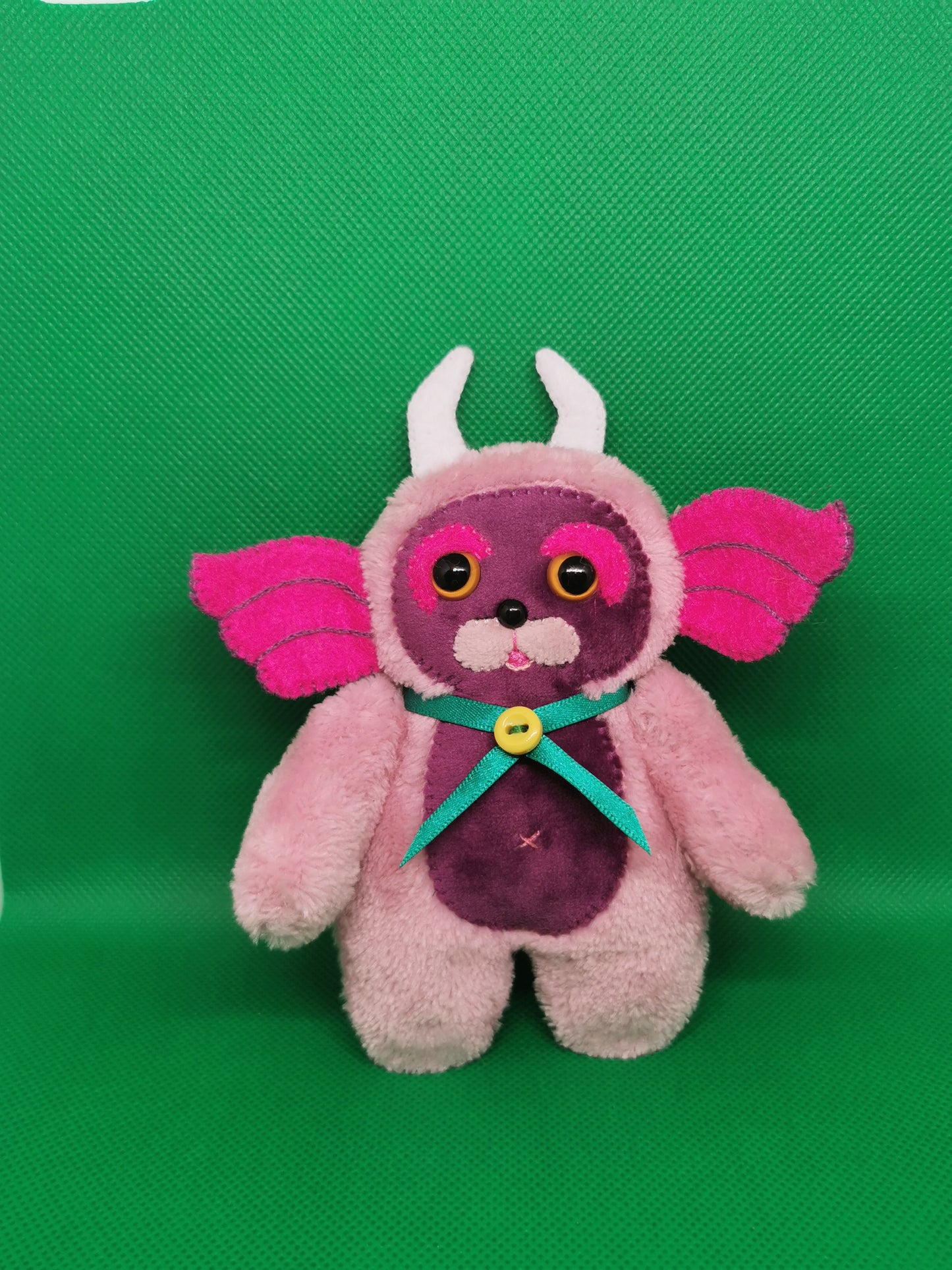 Handmade pocket Goblin plushie in dusty pink and purple