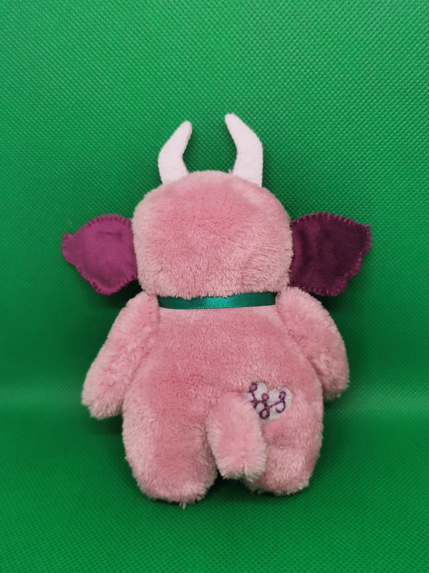 Handmade pocket Goblin plushie in dusty pink and purple